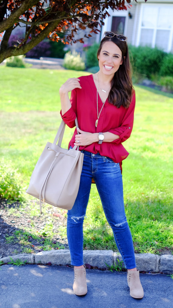 Burgundy tunic and ripped jeans