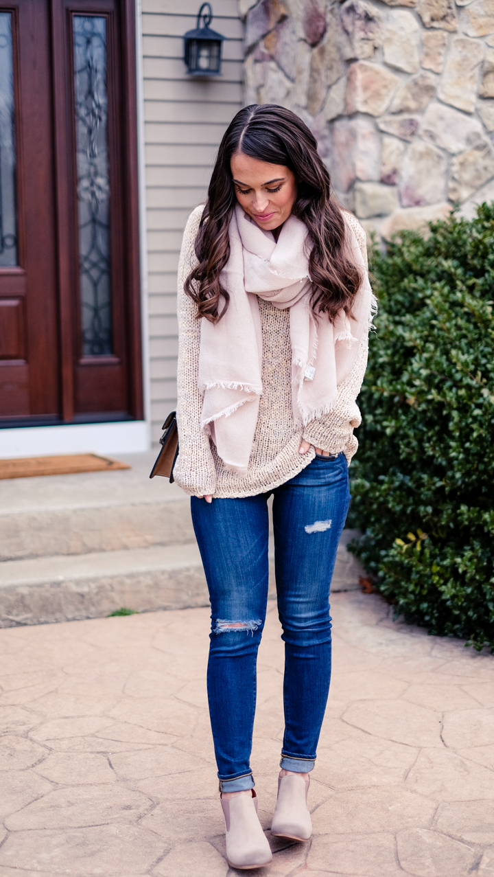 blush pink scarf with tan sweater, white distressed boyfriend