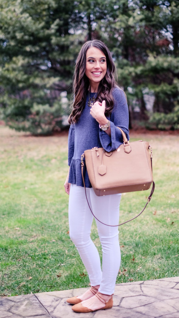 Blue peplum top and white jeans outfit idea