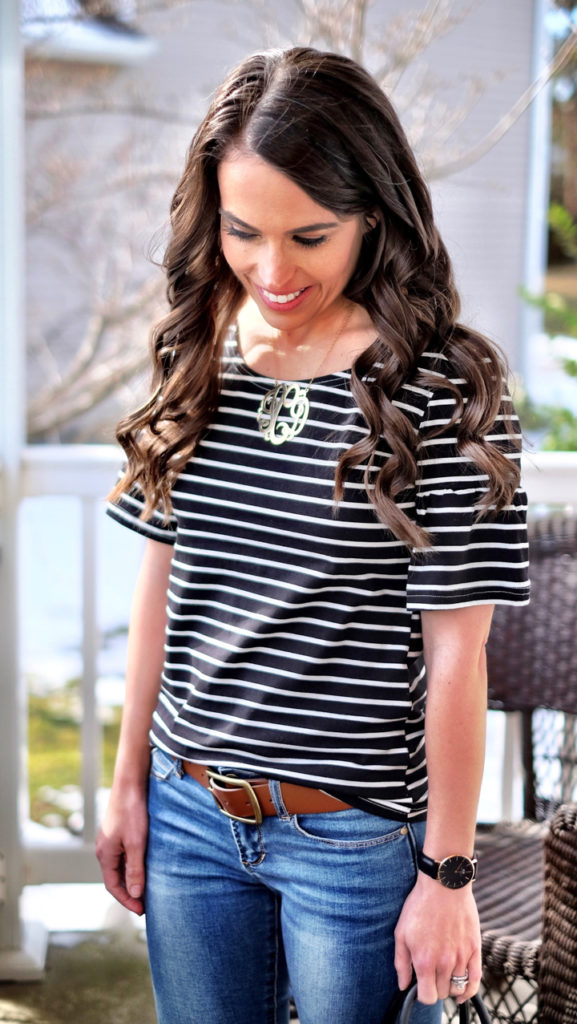 black and white striped tee and brown belt
